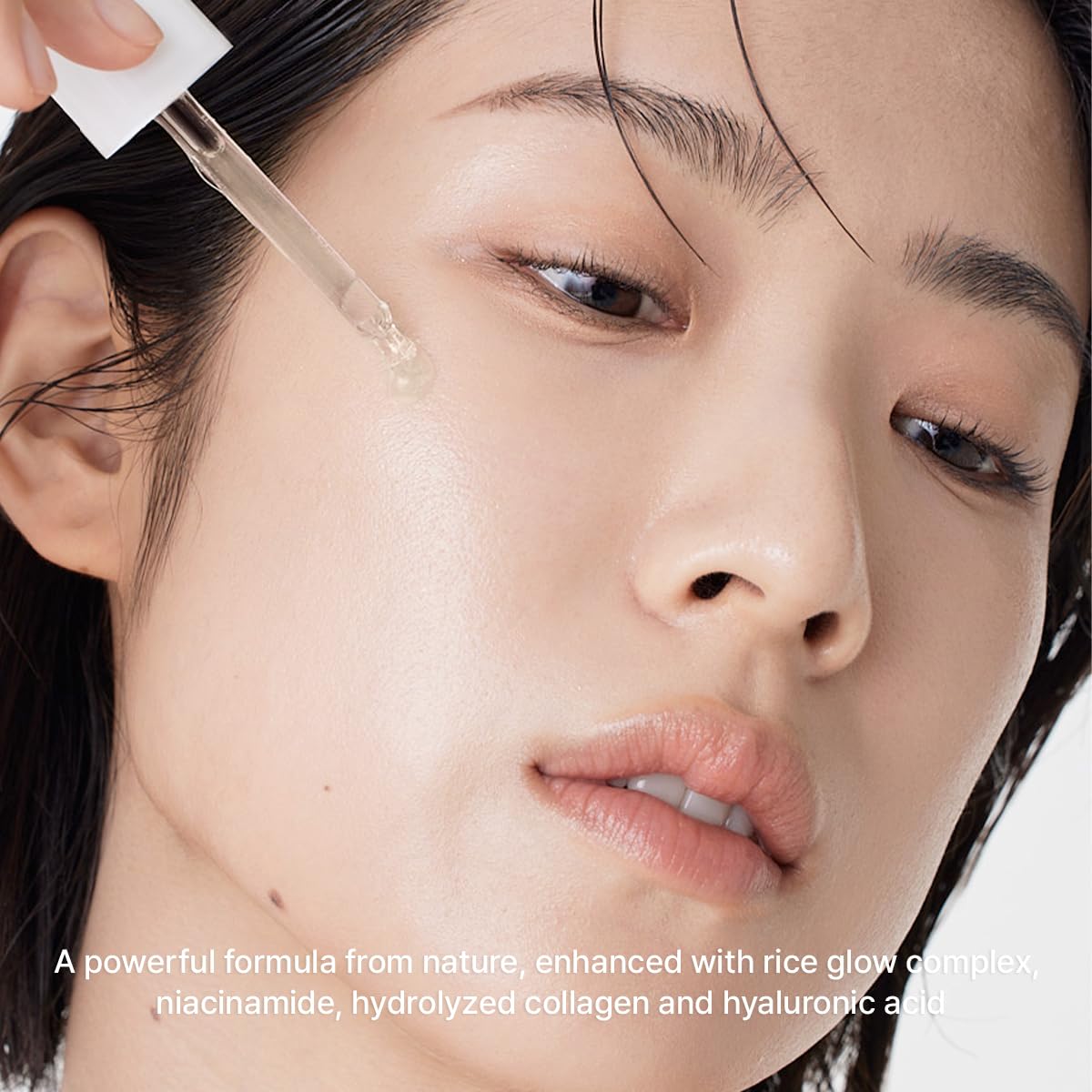 ARENCIA serum on bathroom vanity staged to show daily skincare routine