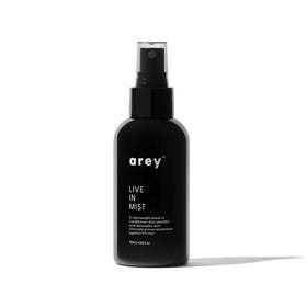Arey Live In Mist front bottle showing label and size, benefits visible
