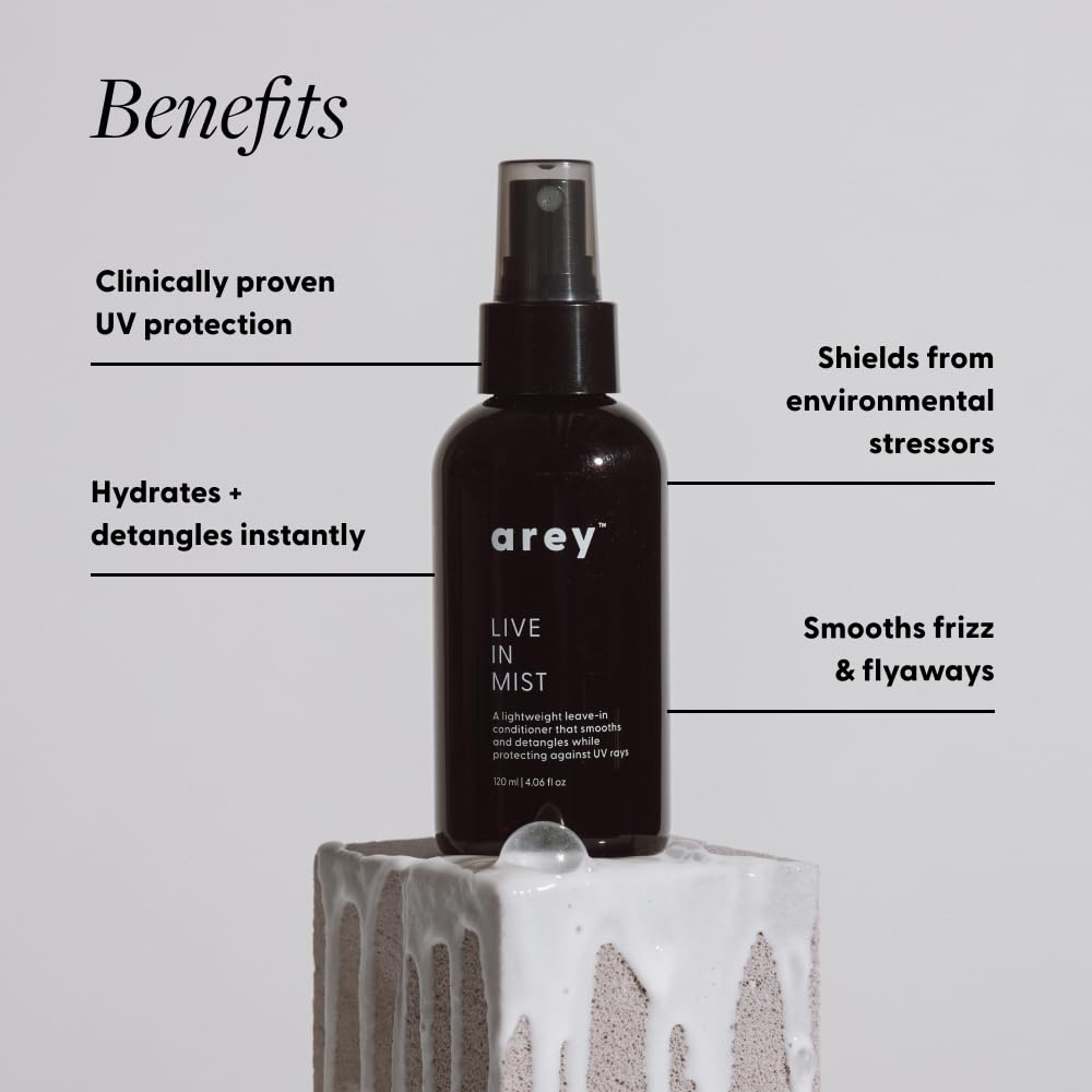 Arey Live In Mist spraying onto hair, delivers hydration and protection