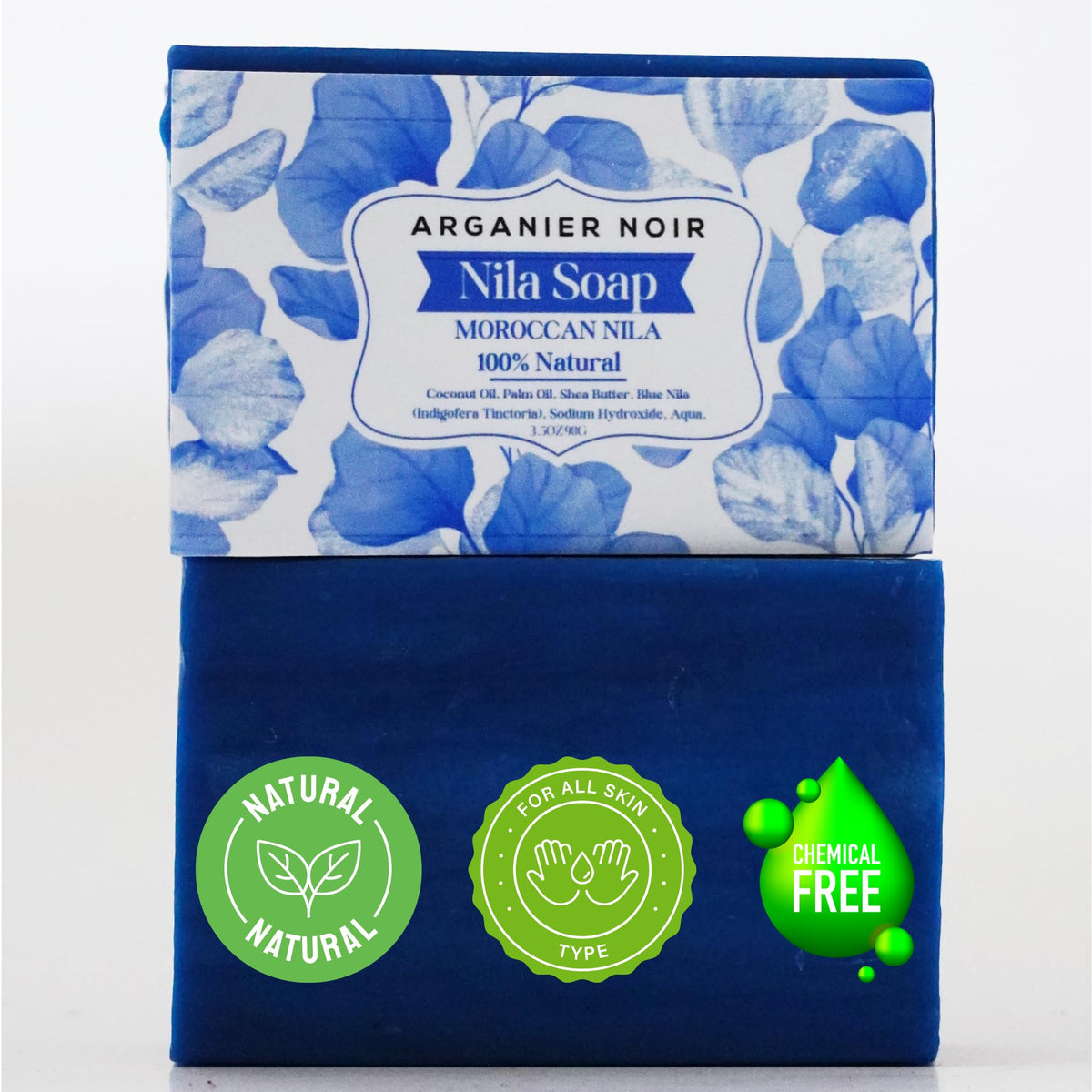 Arganier Noir soap held in hand to show size and easy, travel-friendly use