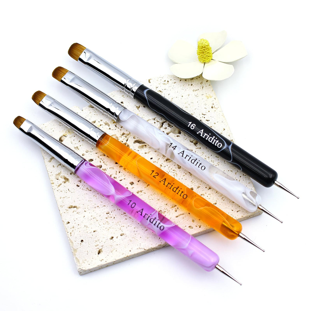 Aridito brush tip closeup showing tapered bristles for smooth, precise French lines