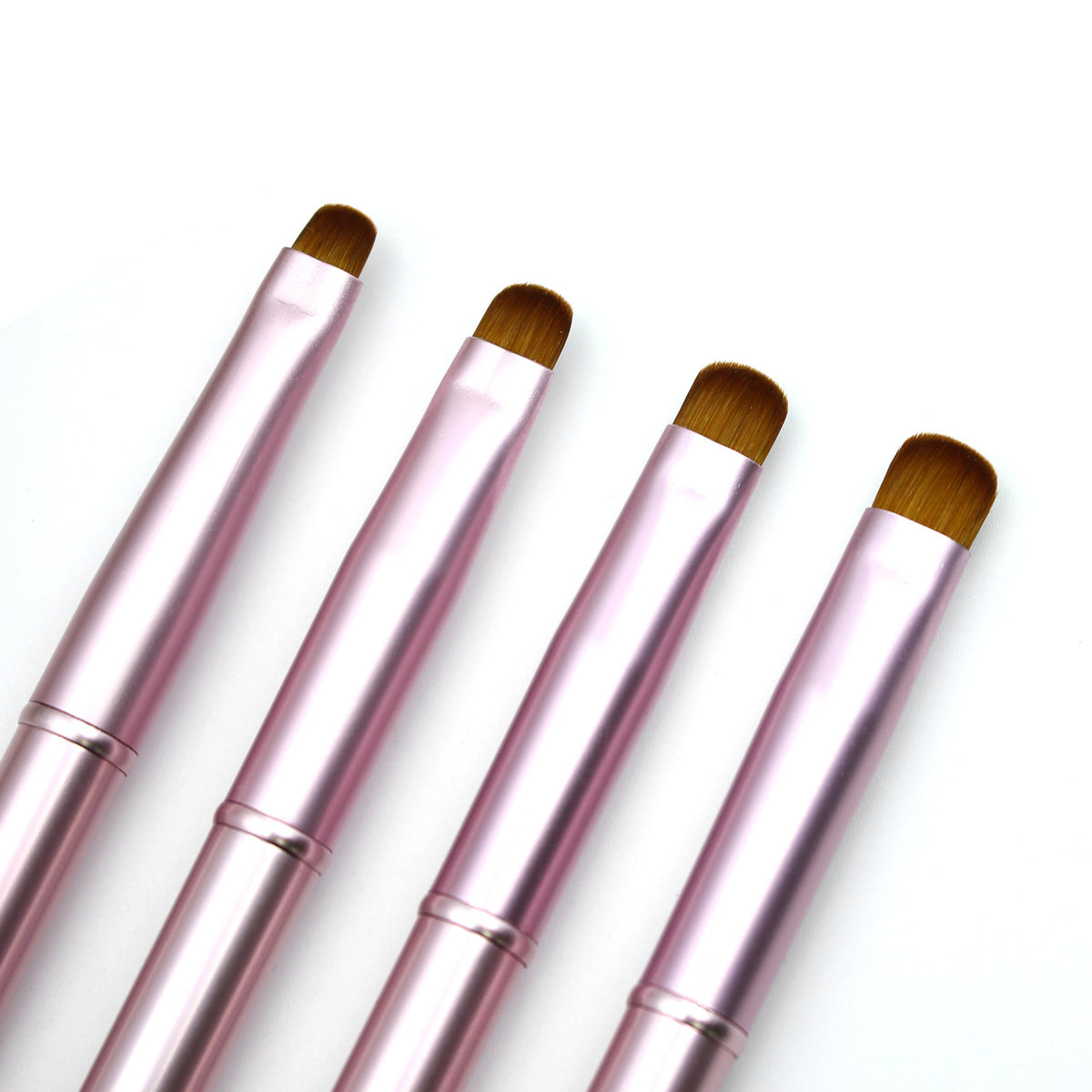 Aridito front view of four pink metal-handle brushes showing sizes and professional look