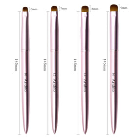 Aridito brush held drawing a French tip demonstrating smooth application control