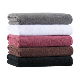 Arkwright LLC towel beside ruler showing 16 x 27 inch size and coverage benefit