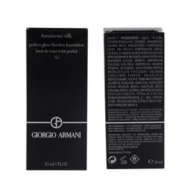 Armani Beauty 30 ml bottle beside common objects to show compact size