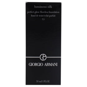Armani Beauty texture swipe on white surface showing silky, lightweight finish