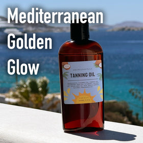 AROMASOFNAT bottle on towel at sunset evoking beach-ready radiance