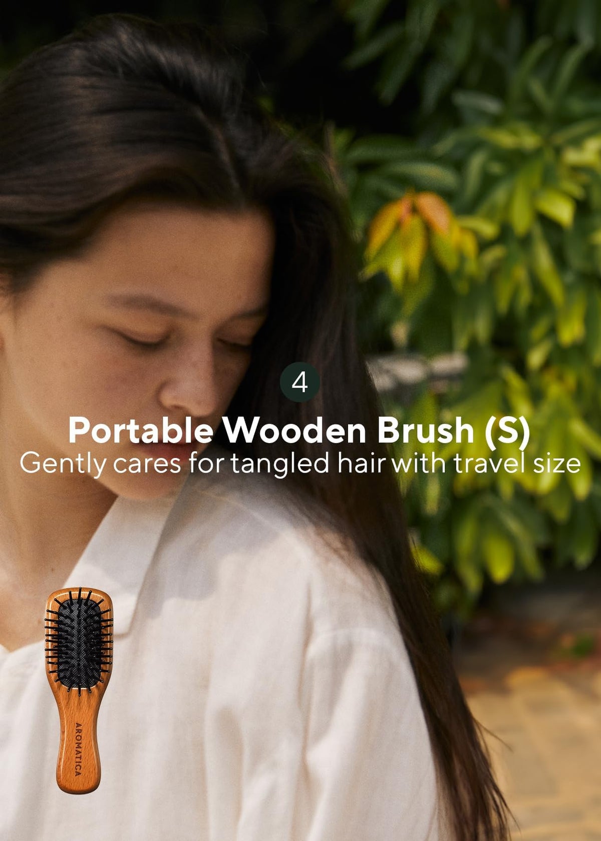 AROMATICA kit next to passport to show travel-friendly compact size