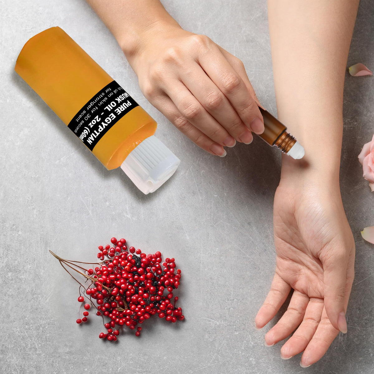 AromaZen roll-on being applied to wrist for long-lasting personal scent