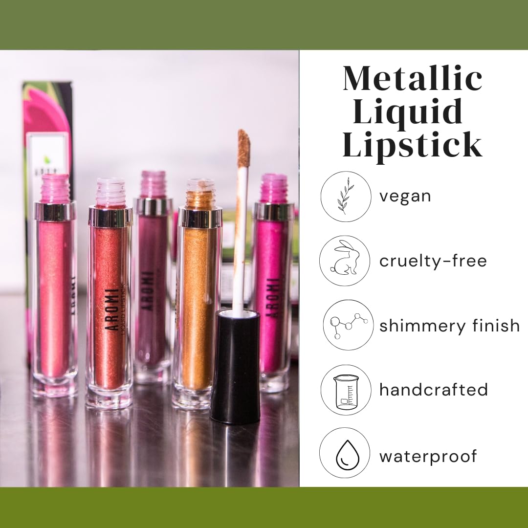 Aromi lipstick held in hand to show size and easy portability benefit: travel-friendly tube