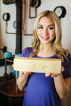 Artemis Organic Soaps loaf with recycled packaging in lifestyle scene showing eco-friendly benefit