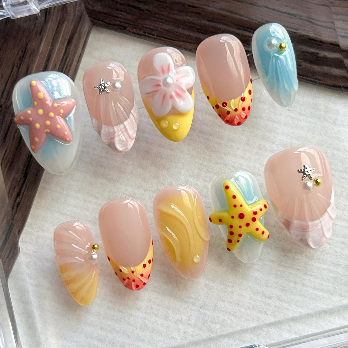 ARTIXY close-up of 3D beach nail detail highlighting texture and summer style benefit