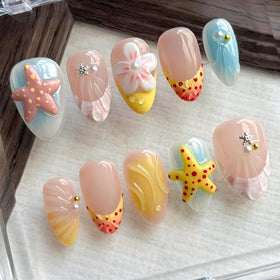 ARTIXY close-up of 3D beach nail detail highlighting texture and summer style benefit
