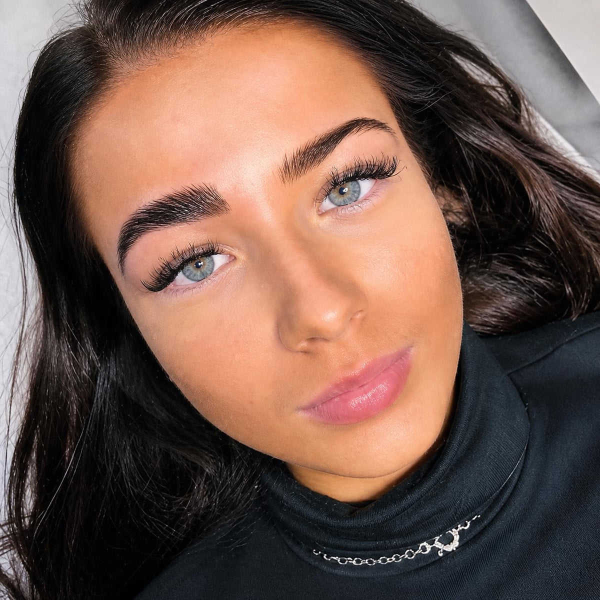 ARYANA NEW YORK before and after brow comparison highlighting fuller feathered finish