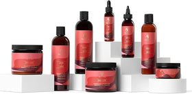 As I Am conditioner applied to long hair during detangling for smoother strands