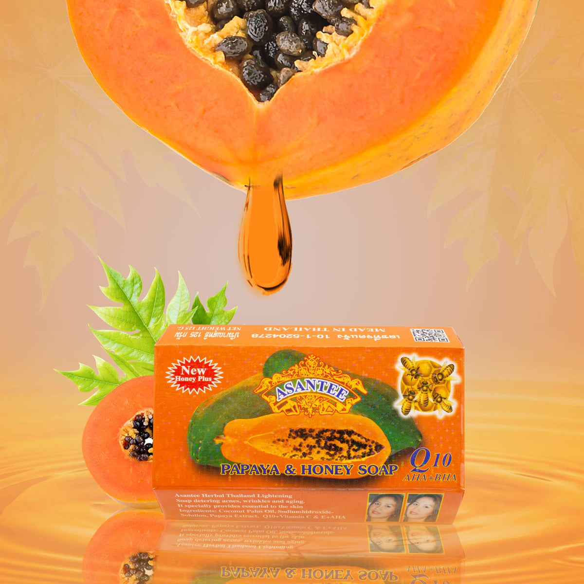 ASANTEE soap displayed with papaya slice and honey jar, highlights natural ingredients