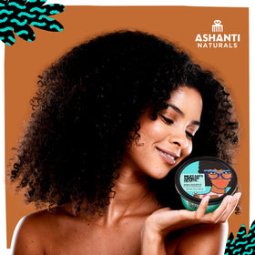 Ashanti Naturals applying Coco Mango Souffle to arm for immediate softening benefit