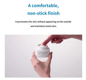 ATOMY cream being applied to finger demonstrating easy spreadability benefit