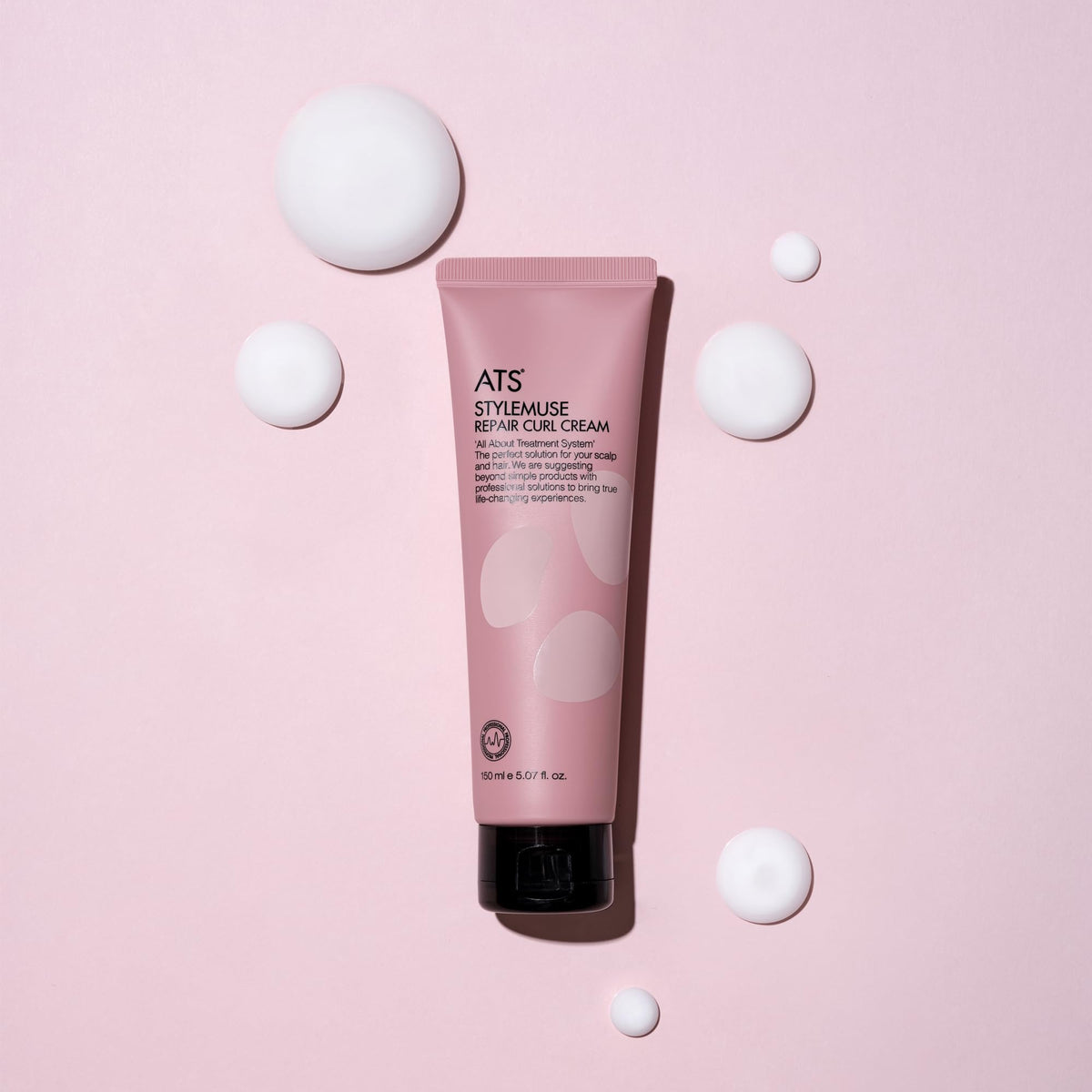 ATS Professional applying cream to wet hair for easier styling