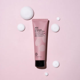ATS Professional applying cream to wet hair for easier styling