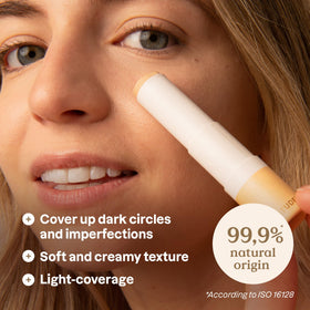 ATTITUDE concealer texture swatch on skin showing creamy blendable finish benefit
