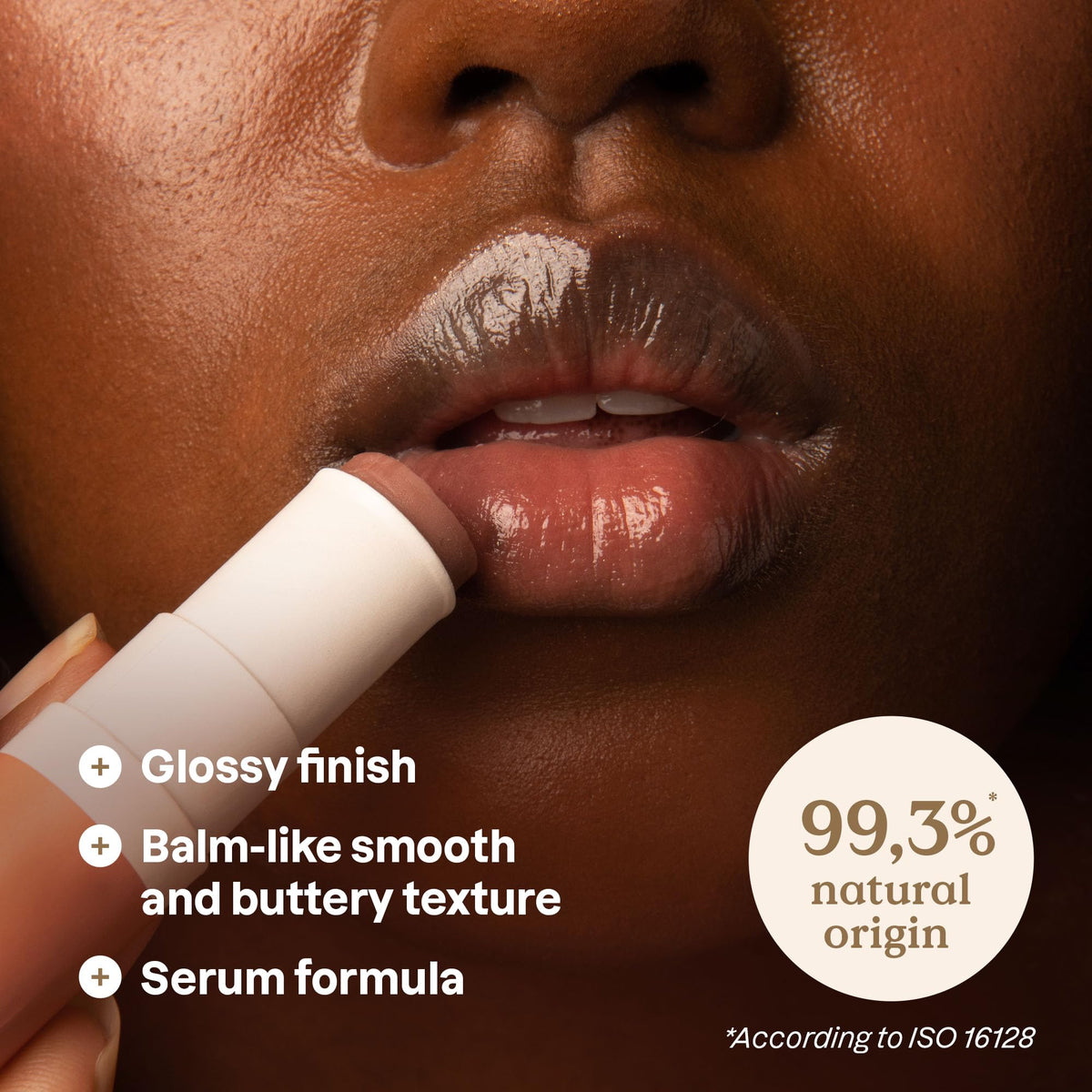 ATTITUDE close-up of gloss stick tip texture showing balm-like sheen and smooth glide benefit