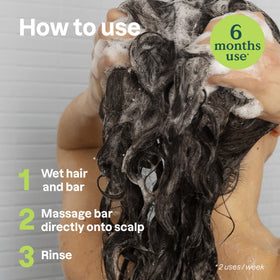 ATTITUDE shampoo bar on bathroom shelf showing sustainable routine benefit