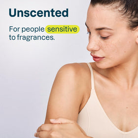 ATTITUDE sunscreen stick beside phone to show compact 2.1-ounce size