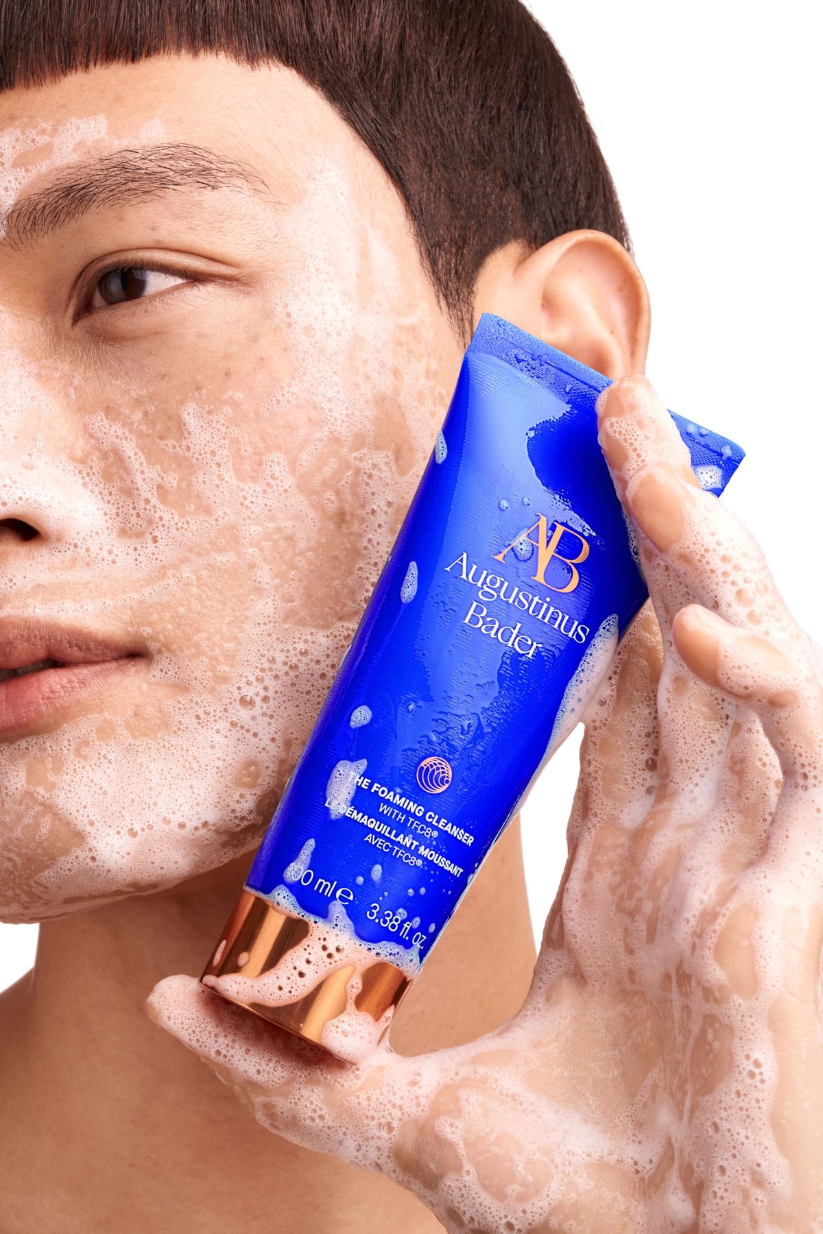 Augustinus Bader foam on hand illustrating soft cleansing action and hydration benefit