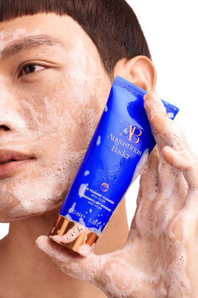 Augustinus Bader foam on hand illustrating soft cleansing action and hydration benefit