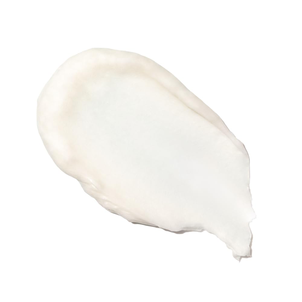 Augustinus Bader shampoo foam texture close-up demonstrating gentle lather