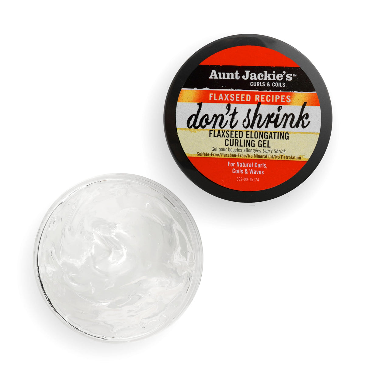 Aunt Jackie's gel being raked through wet hair giving defined, elongated curls