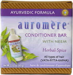 Auromere conditioner bar close-up texture highlights creamy herbal formula for smooth hair