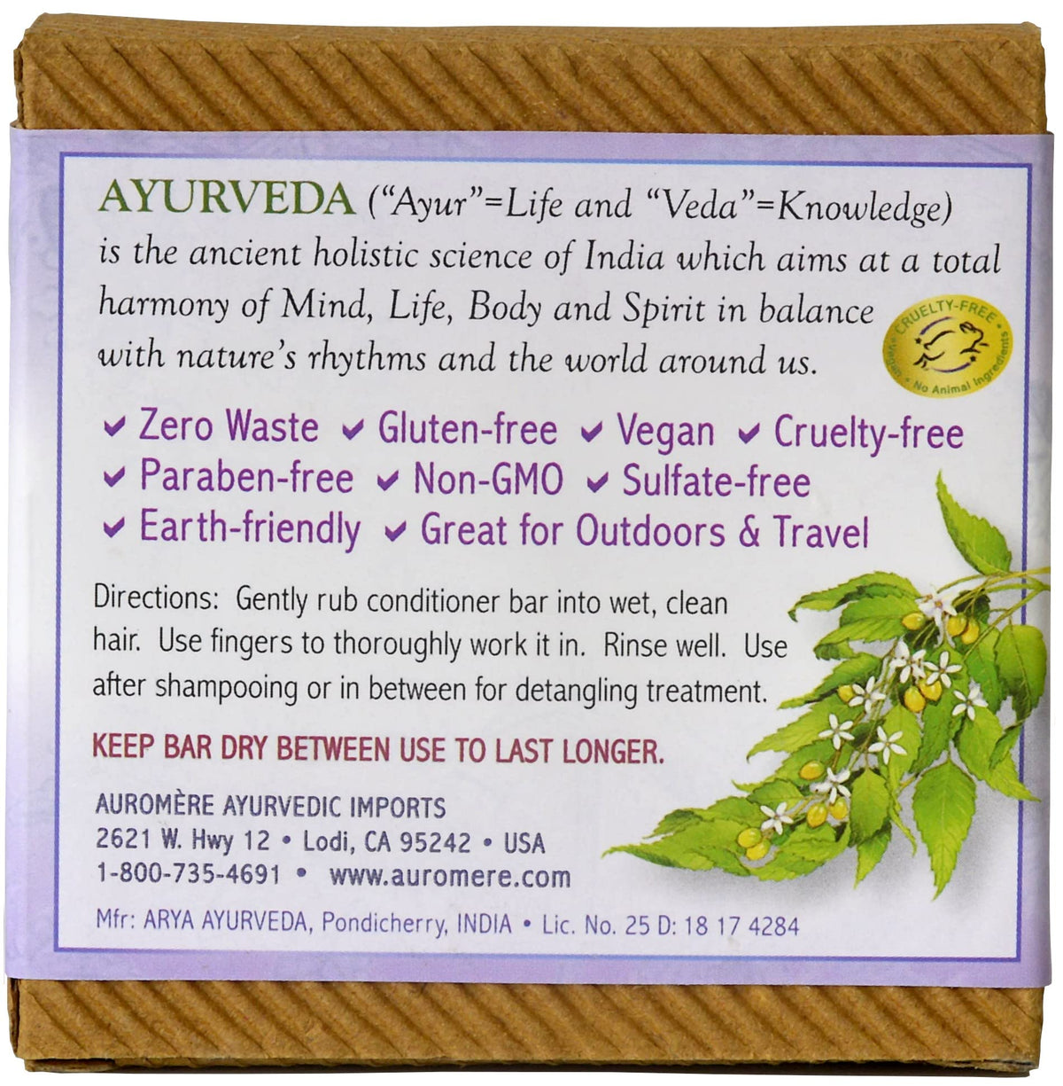 Auromere conditioner bar in hand demonstrates travel-friendly size and spill-free convenience