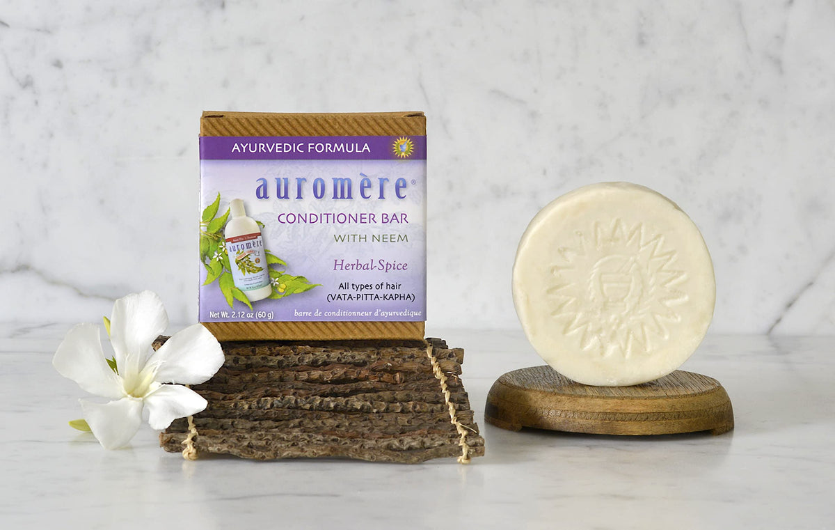 Auromere conditioner bar label with neem ingredient list shows natural conditioning benefits