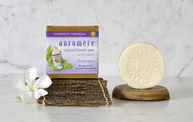 Auromere conditioner bar label with neem ingredient list shows natural conditioning benefits