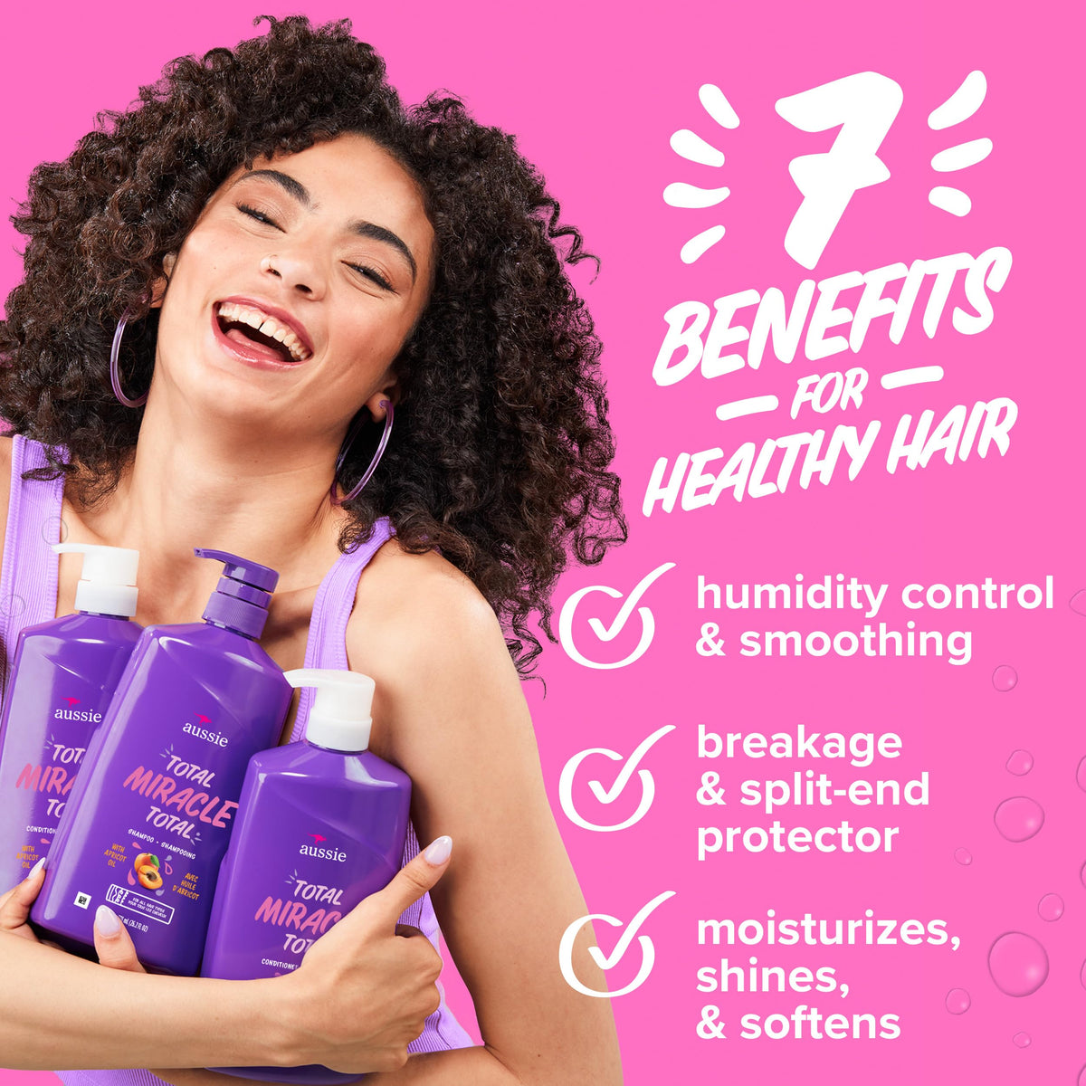 Aussie conditioner with open cap displaying rich creamy texture