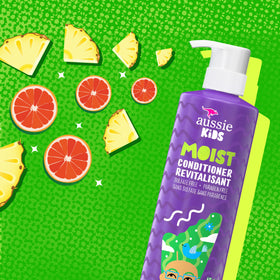 Aussie in-family bathroom scene with child using conditioner, promoting gentle routine benefits