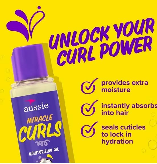 Aussie oil applied to hair mid-lengths demonstrating frizz control benefit