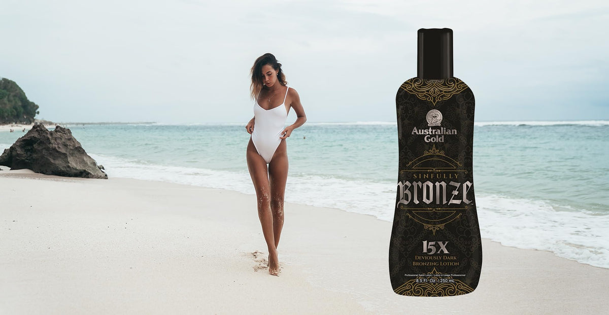 Australian Gold bottle on salon tanning bed showing professional indoor tanning use