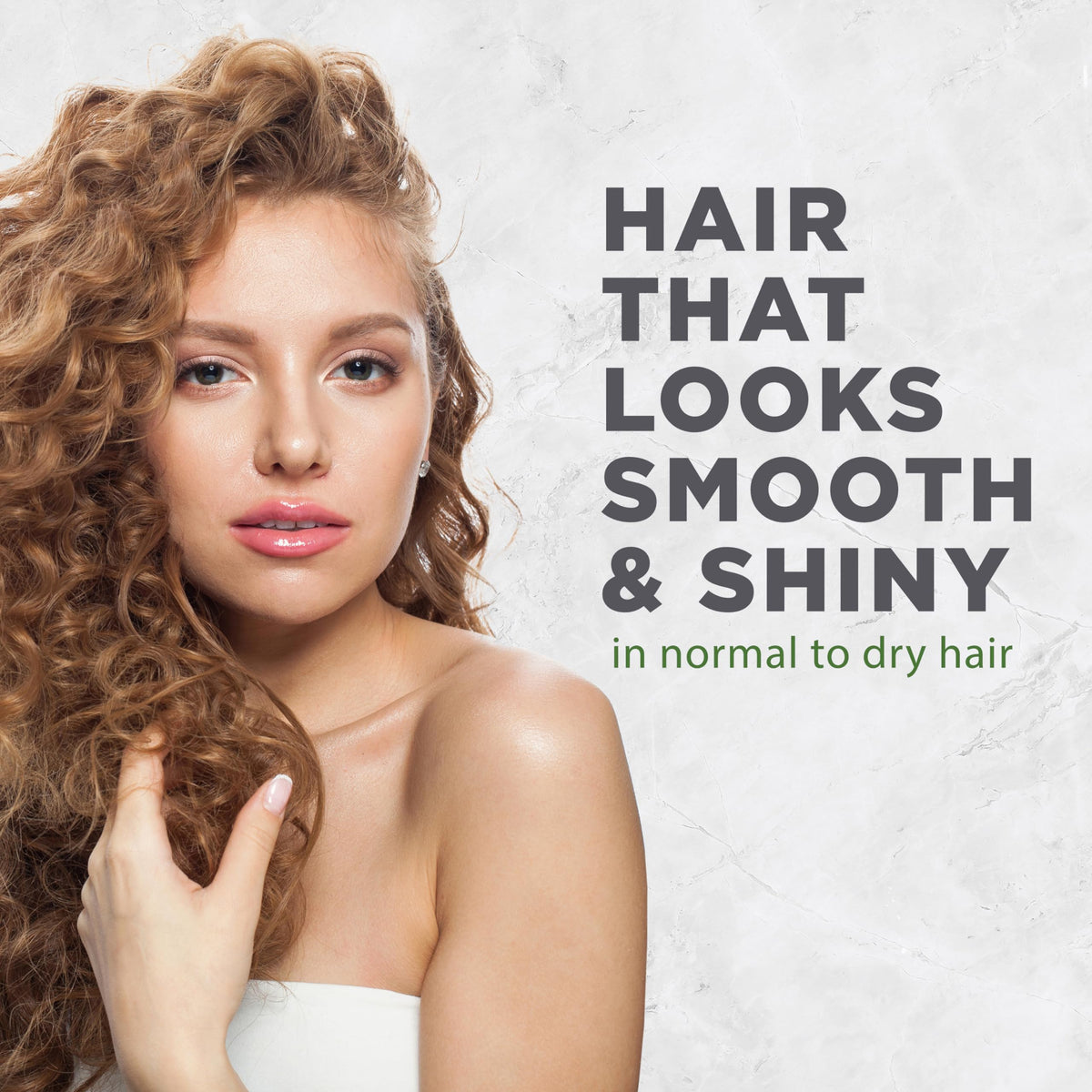 Avalon Organics creamy conditioner texture dispensed to show moisturizing slip