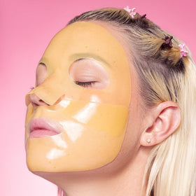 Avatara mask pack beside phone to show compact size and travel-friendly benefit