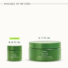 Aveda Be Curly masque on a bathroom shelf with towels showing lifestyle use and fresh citrus scent