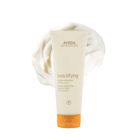 Aveda bottle front view showing packaging and brand for confident daily use