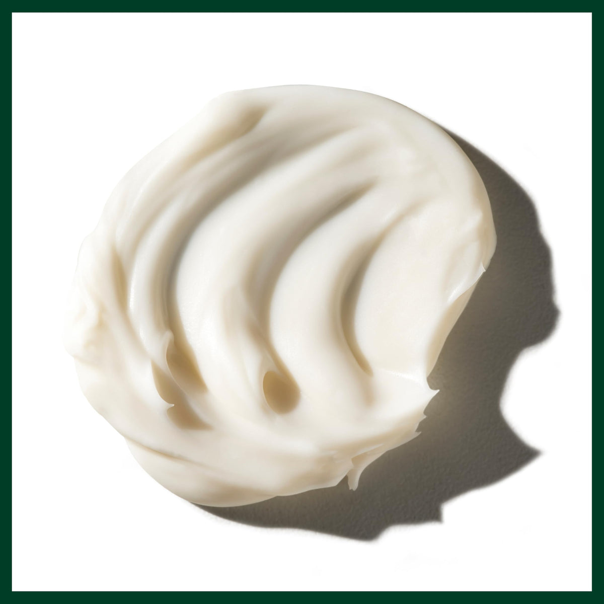 Organic shea butter and olive oil beside Aveda jar illustrating nourishing ingredients