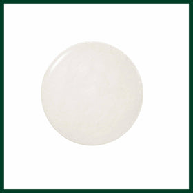 Aveda product label close-up highlighting key botanical ingredients benefit