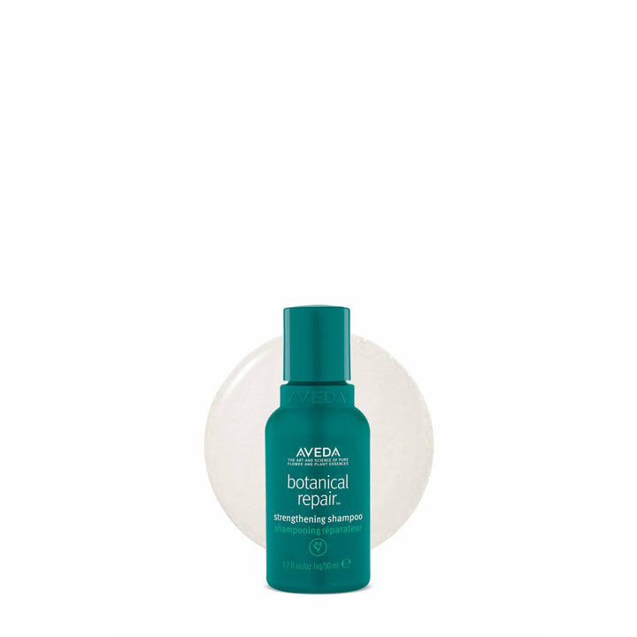 Aveda bottle front packaging showing product name and compact travel size benefit
