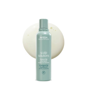 Aveda bottle front view showing brand and balancing shampoo benefit