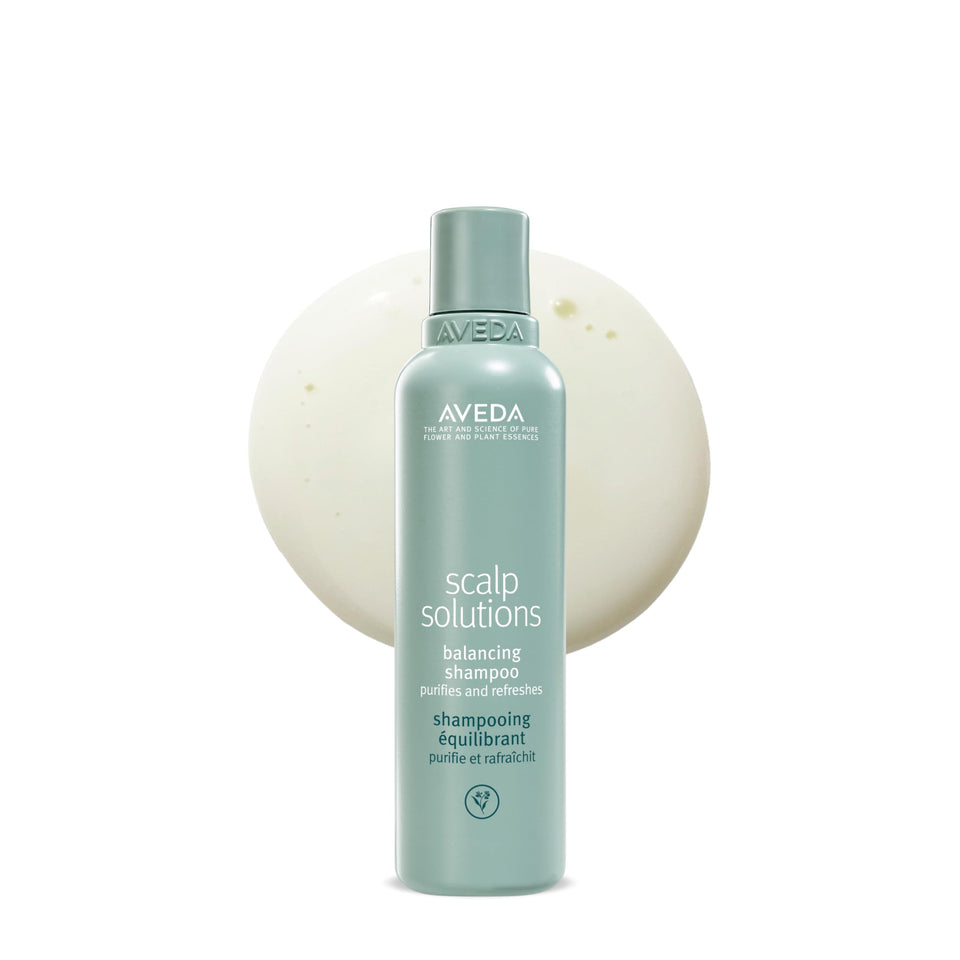 Aveda bottle front view showing brand and balancing shampoo benefit