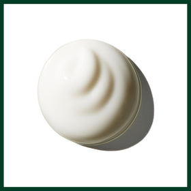 Model with defined curls using Aveda Brilliant creme, shows enhanced texture